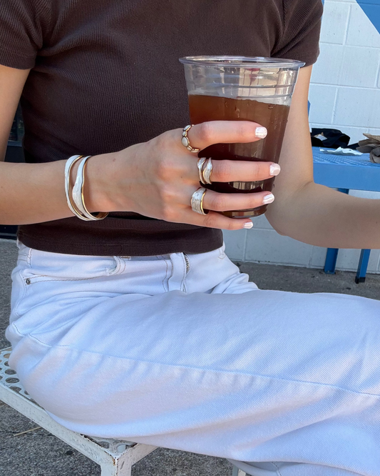 Tide white and gold ring